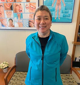 Suan, the head dental assistant at K.I.S.S. Dental Care